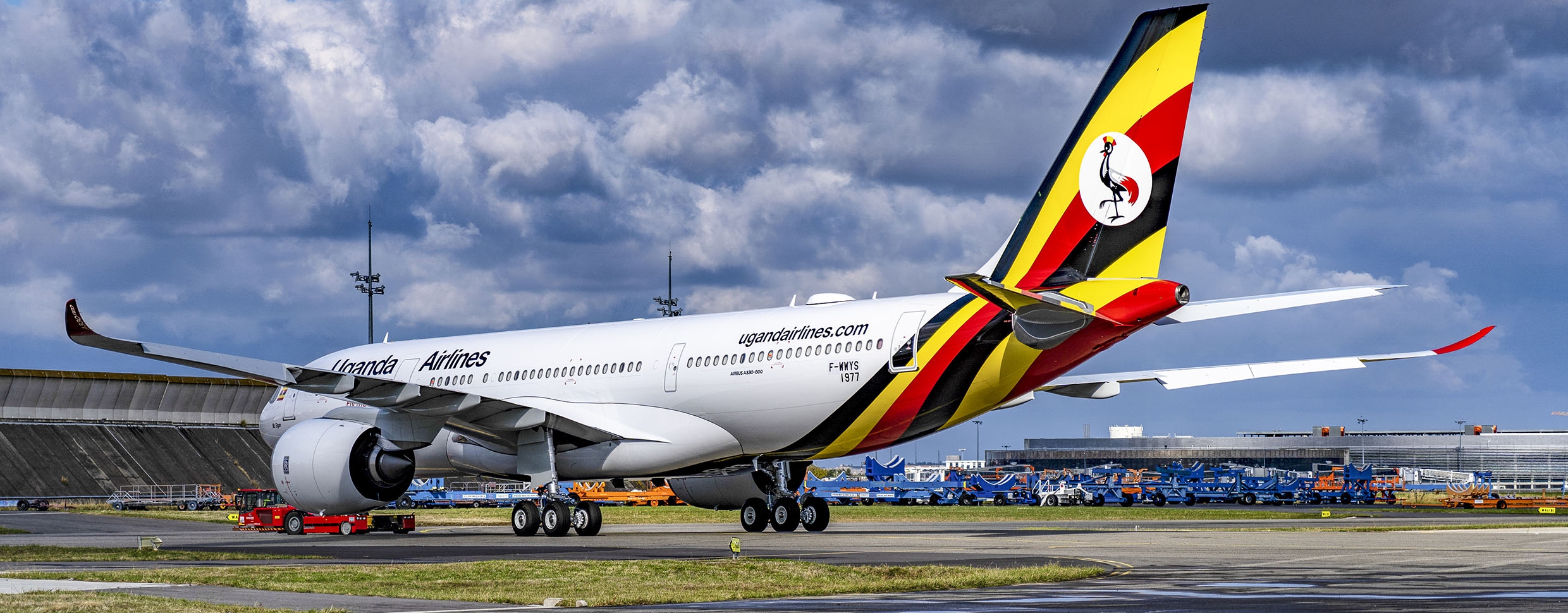 A330-800-Uganda-Airlines-MSN1977-Roll-Out-Paintshop-010_Fotor